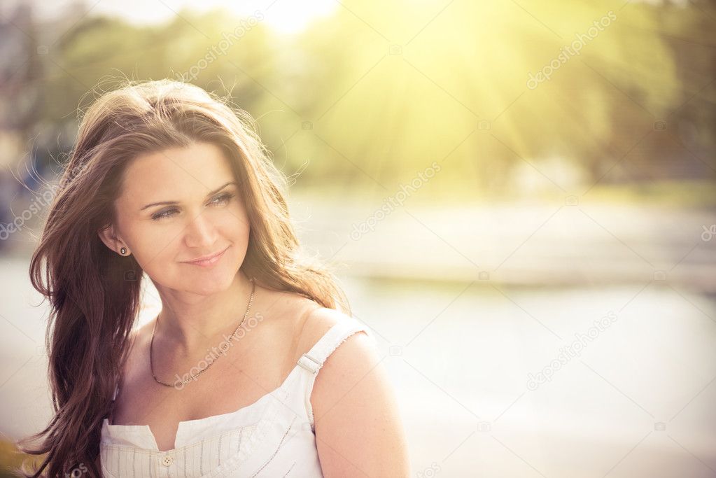 beautiful woman smiling outdoors