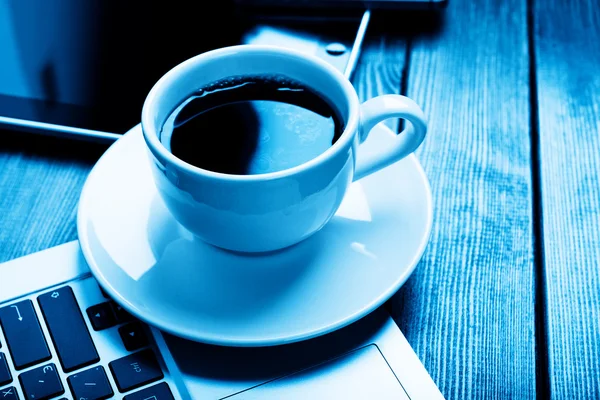 Office desk with laptop computer — Stock Photo, Image