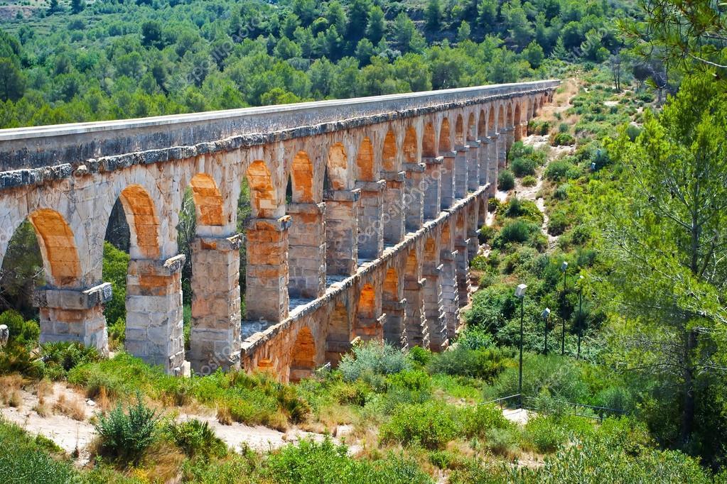 Roman aqueduct in Tarragona — Stock Photo © nikascorpionka 58187469