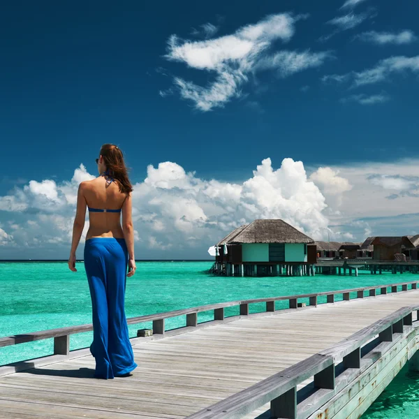 Woman on wooden jetty — Stock Photo, Image