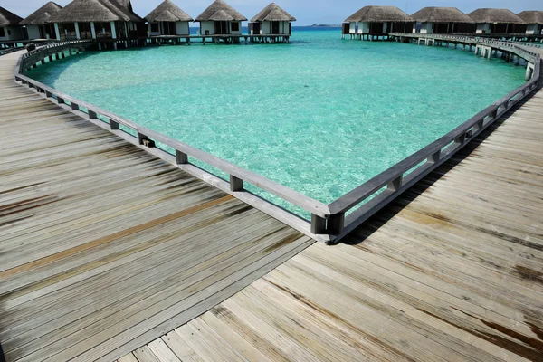 Beach with water bungalows — Stock Photo, Image