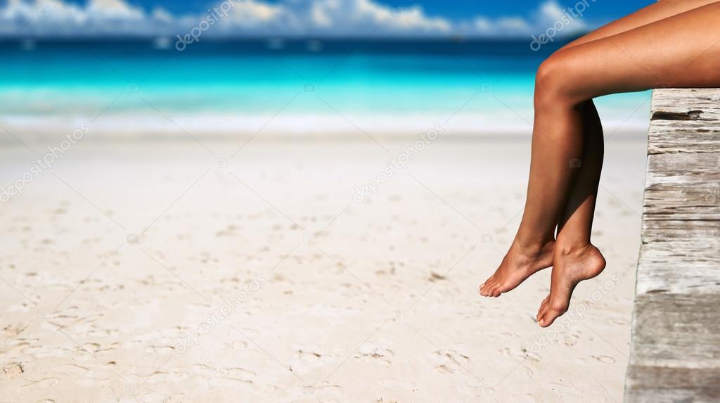 Woman at beach  jetty