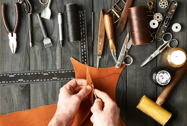 Man working with leather — Stock Photo © haveseen #99783092