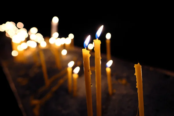 Burning candles in church — Stock Photo, Image