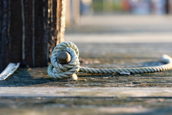 Rope on wooden jetty