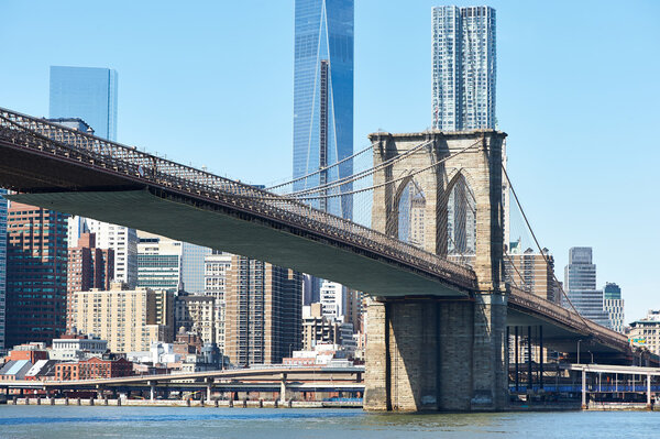Brooklyn Bridge with lower Manhattan skyline in New York City