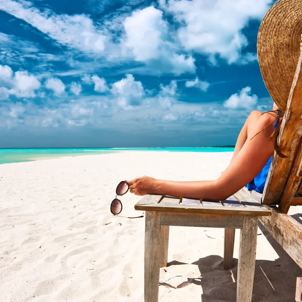 Woman holding sunglasses — Stock Photo, Image