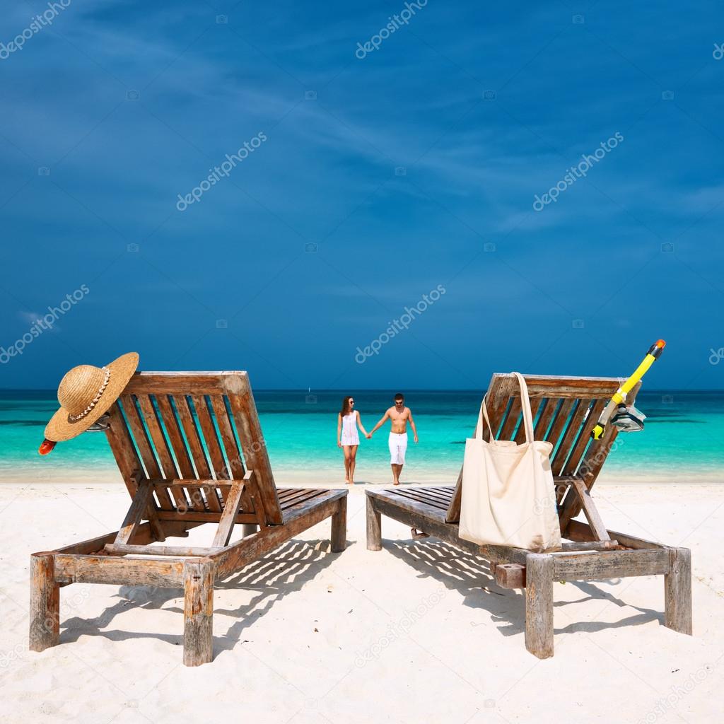 Couple running on beach