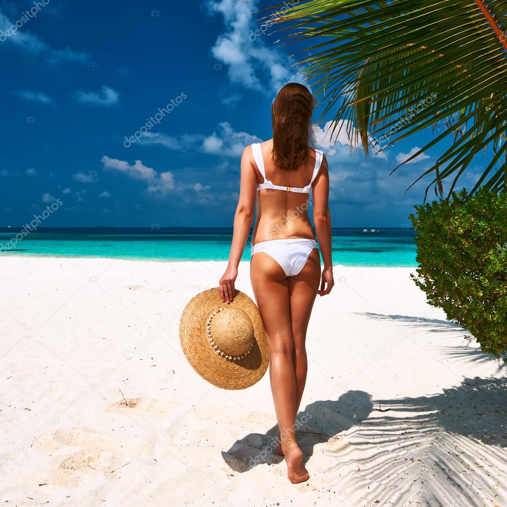 Woman in bikini on beach at Maldives