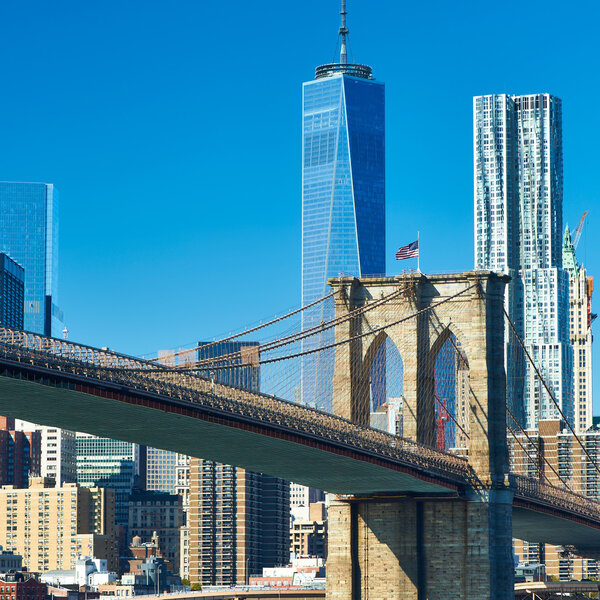 NEW YORK CITY - APRIL 04, 2014: Manhattan skyline with Brooklyn bridge in New York City at April 4 th, 2014 in Manhattan, New York City, America