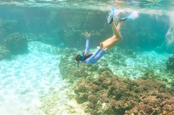 Woman with mask snorkeling Stock Photo