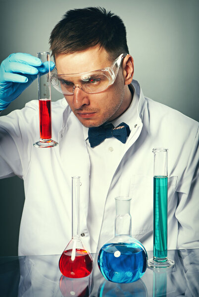 Scientist in protective glasses