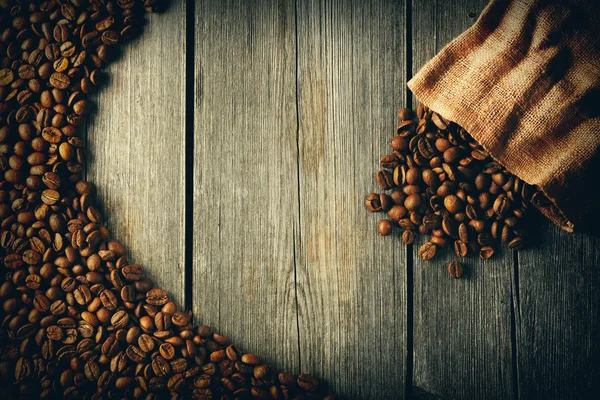 Coffee beans and bag background — Stock Photo, Image