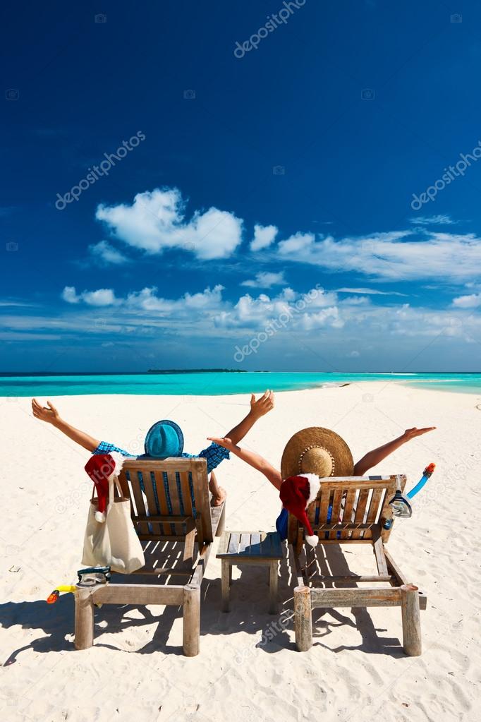 Couple on tropical beach at christmas