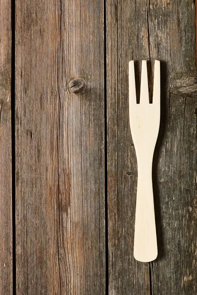 Holzgabel auf dem Tisch — Stockfoto