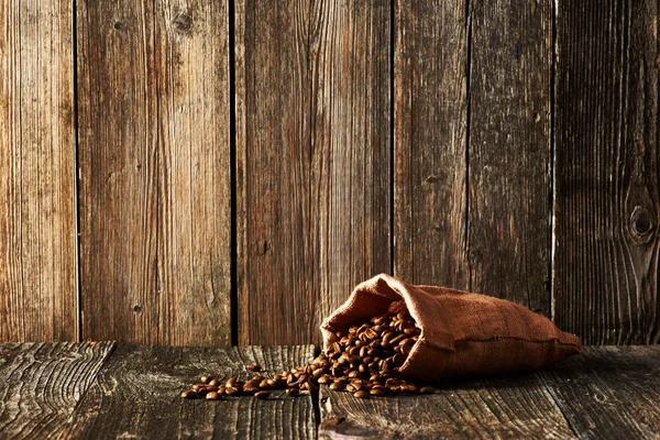 Coffee beans in sack — Stock Photo, Image