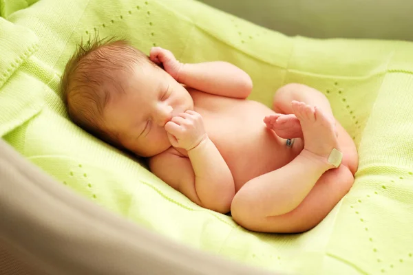 Newborn baby in bed — Stock Photo, Image