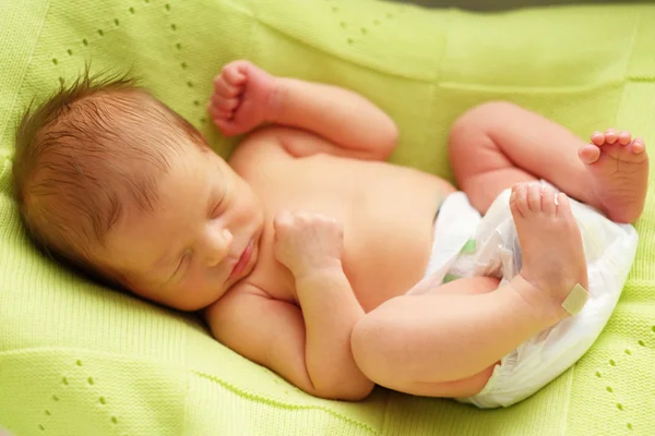 Newborn baby in bed — Stock Photo, Image