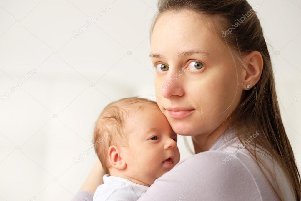 newborn baby with mother