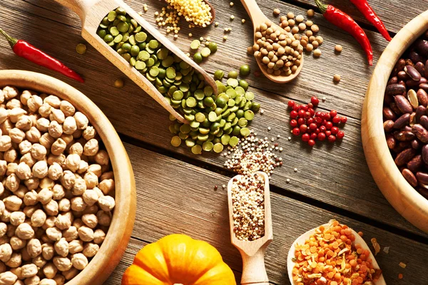 Spoons of various legumes — Stock Photo, Image