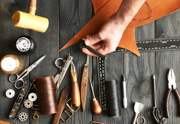 Man working with leather — Stock Photo, Image