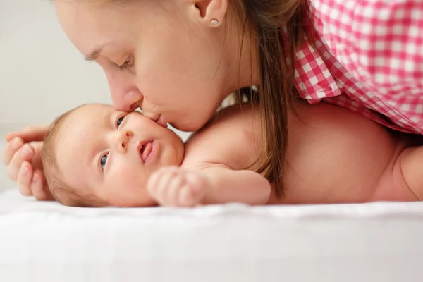 Newborn baby with mother Royalty Free Stock Photos