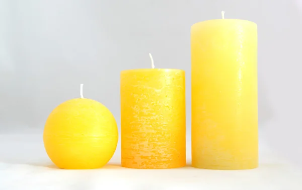 Gele kaarsen — Stockfoto