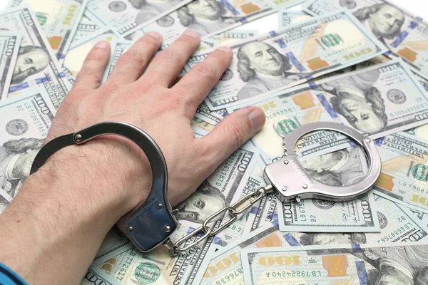 Hand in handcuffs — Stock Photo, Image