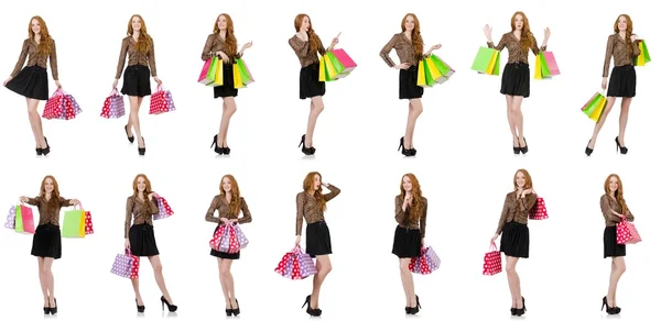 Mulher com sacos de compras isolados em branco — Fotografia de Stock