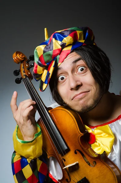 Funny violin clown player in musical concept — Stock Photo, Image