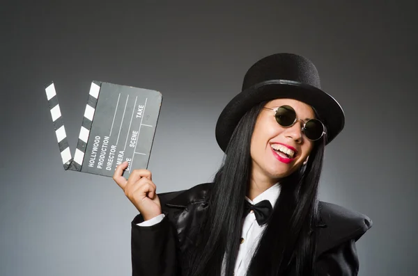 Woman with vintage hat and movie board — Stock Photo, Image