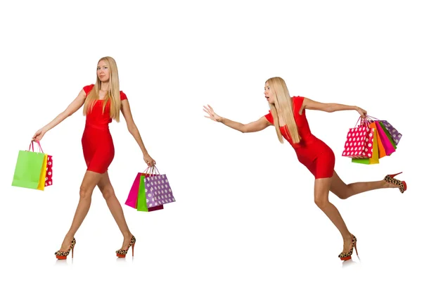 Kvinna med shoppingväskor isolerade på vitt — Stockfoto