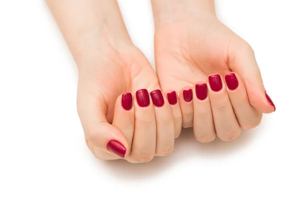 Manos de mujer con uña roja aislada en blanco —  Fotos de Stock