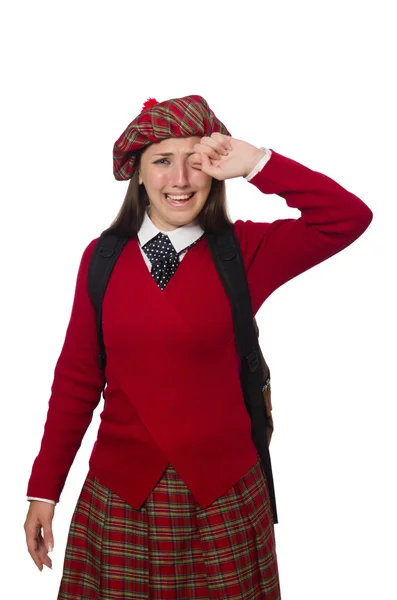 Meisje in Schotse tartan kleding op wit wordt geïsoleerd — Stockfoto