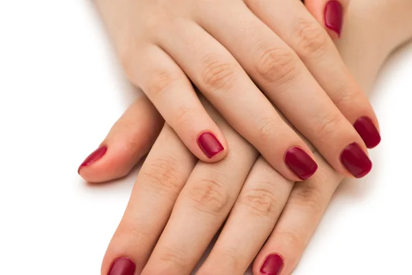 Woman hands with red nail isolated on white — Stock Photo, Image