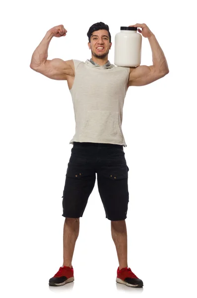 Homem muscular com frascos de proteína no branco — Fotografia de Stock