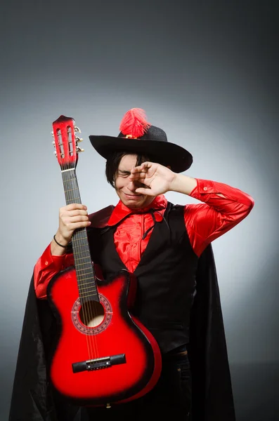 Man playing guitar in romantic concept — Stock Photo, Image