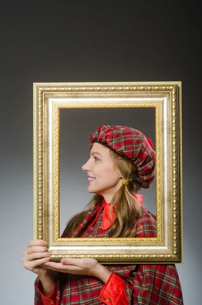 Woman in scottish clothing in art concept — Stock Photo, Image