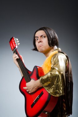 Adam gitar müzik konsepti ile