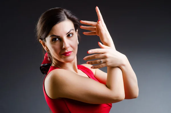 Woman dancing dances in red dress — Stock Photo, Image