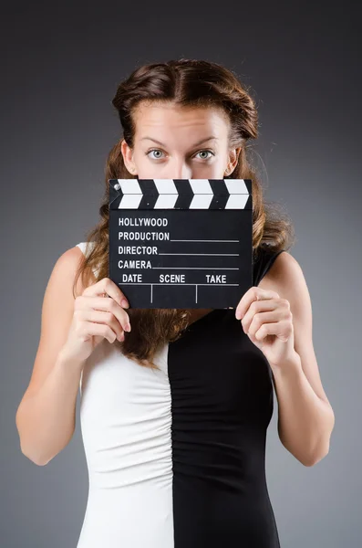 Young woman in movie concept — Stock Photo, Image