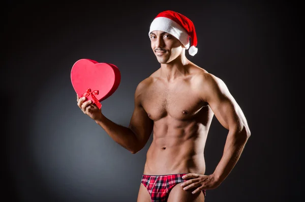 Ripped young man in studio concept — Stock Photo, Image