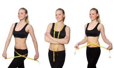 Diyet konseptinde santimetre olan genç bir kız.