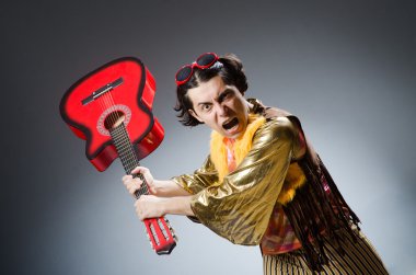 Adam gitar müzik konsepti ile