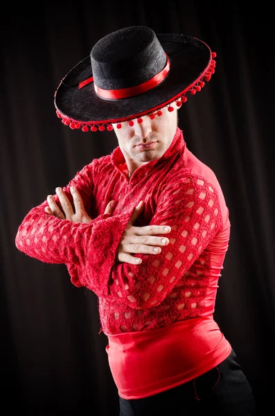 Man dancing spanish dance in red clothing — Stock Photo, Image