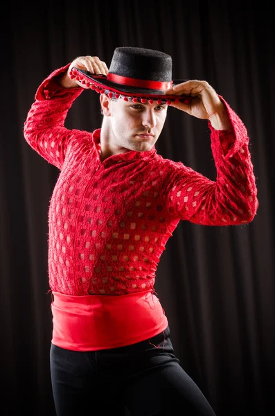 Man dancing spanish dance in red clothing — Stock Photo, Image