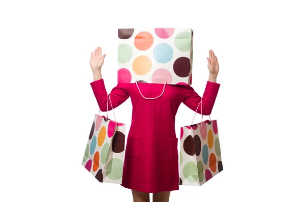 Menina Shopper em vestido rosa segurando sacos de plástico — Fotografia de Stock