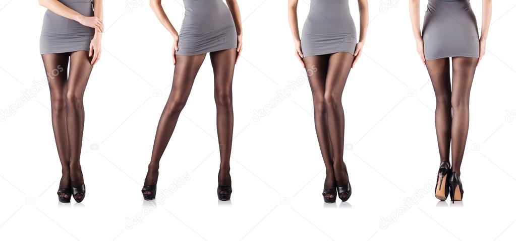 Woman with tall legs isolated on white