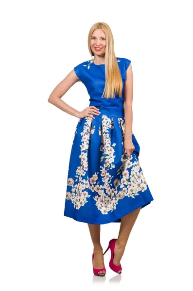 Vrouw in lange blauwe folral jurk geïsoleerd op wit — Stockfoto