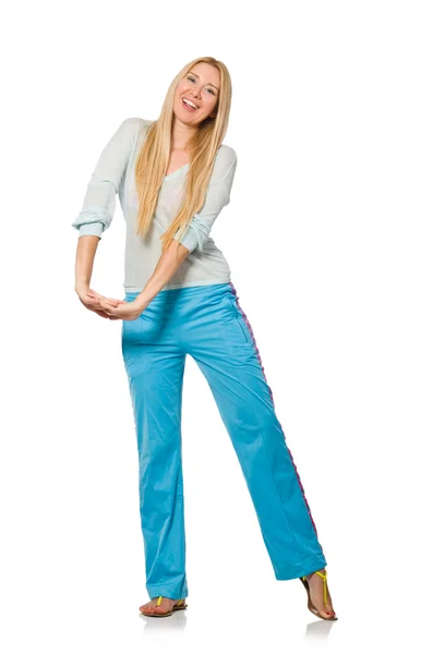 Mujer joven con pantalones de entrenamiento azules aislados en blanco — Foto de Stock